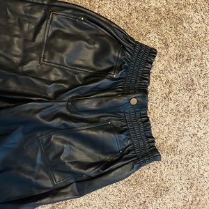 Forever 21 Size Medium. Leather jaggers with scrunch at top